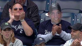 OAK@NYY: Fan wears Jeter mask in the crowd