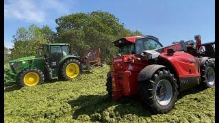 Cumbrian Silage 2024. Nine strong John Deere, MF, NH team with three machines filling both clamps.