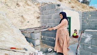 Mother's winter shelter: building firewood storage for heating in the mountains