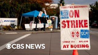 Boeing workers to vote on ending strike as company reports billions in quarterly losses