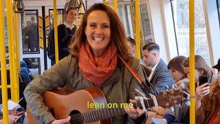 Brave woman inspires train sing along