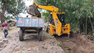 JCB Backhoe Cutting Soil and Loading in Tractor - RoadPlanet JCB Video Collection