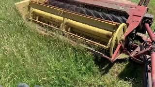 John Deere 2520 mowing hay