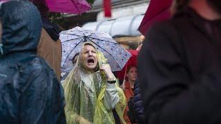 Protesters surround Serbia's state TV station, accusing it of pro-government bias