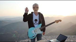 An alien playing Guitar (GRAViiTY - Rising Sun)