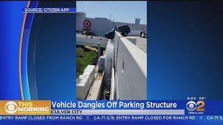 Caught on video: SUV dangles off rooftop parking structure in Culver City