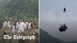 Children trapped in Pakistan gondola after cable snaps