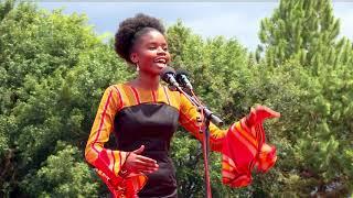 Nantege Rhona reads a stunning poem at Uganda's 59th Indenpendence Day titled 'The Pearl Uganda'