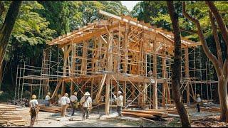 A group of young people build wooden houses in the mountains 1