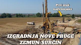 Beograd izgradnja nove pruge Zemun-Surčin krenulo postavjanje stubova nadvožnjaka,direktno sa terena