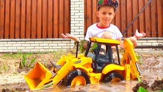 Alex playing with Toy Excavator and ride on big Power wheels