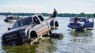 World’s Biggest SEMA Trucks Drive in a Lake! (Cops, DNR, Helicopter Called)