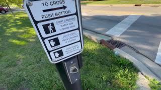 Push or Wave Crosswalk Buttons at - Grace St and St Charles Rd