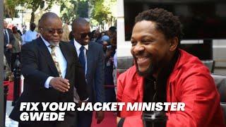 Dress code in Parliament! Dr. Mbuyiseni Ndlozi Helps Minister Gwede Mantashe with Jacket Buttons"