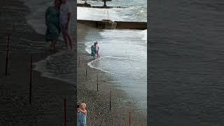 13 Sochi, a couple is photographed against the background of a curtain