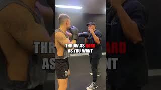 AVOID getting hooked | Coach explains the parry #boxing #shorts