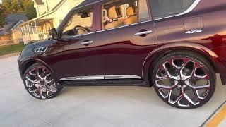 Infiniti QX56 28 inch wheels Candy Wine.