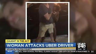 Woman attacks Uber driver