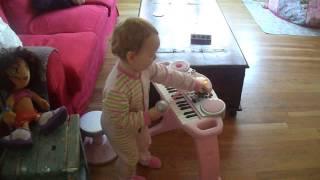 Baby Alexandra with a new piano! A new star is born!