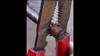 Great trick to clean a greasy bolt with wire strippers.