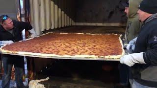 World record pizza taken out of the oven