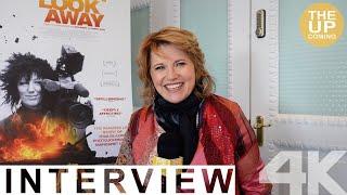 Lucy Lawless interview on Never Look Away