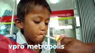 A 9 year old chain smoker from Indonesia - vpro Metropolis