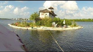 An Island made from plastic bottles by Richart Sowa