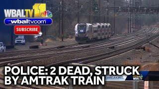 Police: 2 dead, struck by Amtrak train