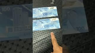 Counterfeit $100 bills in Trinidad and Tobago and how to spot them.