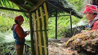 Single girl continues to build bamboo house