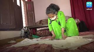 Differently-abled woman stitches masks with her feet!