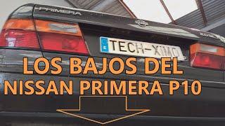 Le vemos los bajos al Nissan Primera P10 de 1992