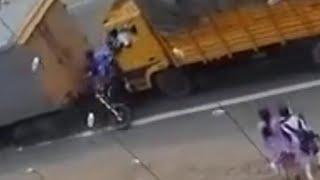 CCTV live accident footage from India: multiple vehicle pileup with lucky escape for bike-riders