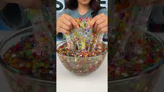 Mixing ORBEEZ Into Slime 