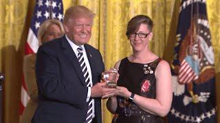 US teacher of the year stages silent protest as Trump awards prize