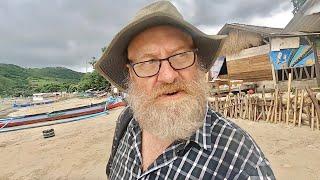 Dog charges me from behind. Random chats on Kuta beach, Lombok.