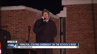 Greendale principal to spend the night on school's roof after students raised thousands for charity