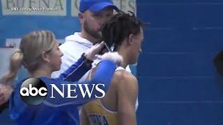 Referee's questionable call for wrestler to cut dreadlocks