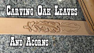 Carving oak leaves and acorns in to a leather belt