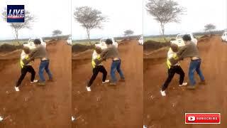 A Chinese assaulting and  fighting a black man (African) in a construction site.