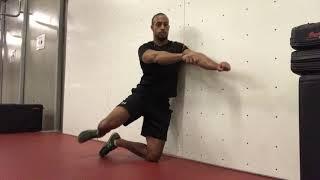 wall leaning half kneeling  outside  global hip rotations