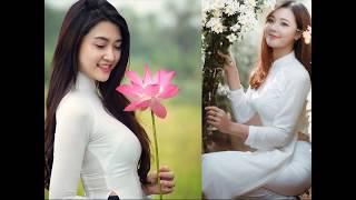 Áo dài trắng tinh khôi duyên dáng đẹp rạng ngời - Pure white Ao Dai gracefully beautiful radiant