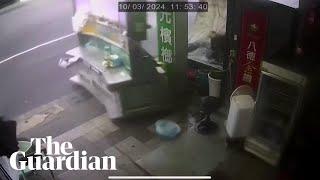 Typhoon Krathon blows away store equipment in Taiwan