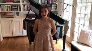 Zoe Davies, 11, singing “America the Beautiful”