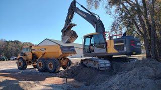 Undercutting The New Road And Parking Area To Put Stone