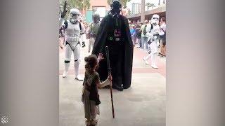 Four-year-old girl dressed as Rey meets Star Wars characters