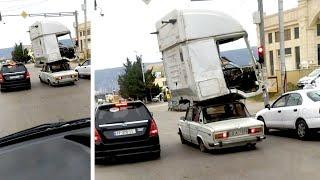 Tiny Car Carries Huge Lorry Cabin On ROOF