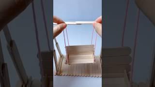 make a swing out of ice cream sticks