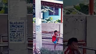 A special boy at a bus stop in Tanjay, Negros Oriental